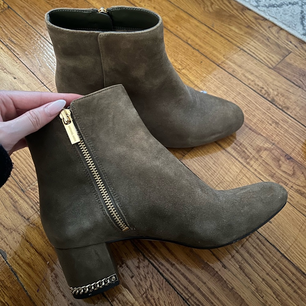 Slightly worn size 7.5 Michael Kors suede ankle boots with gold detailing